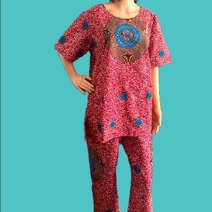 A SET OF A BLOUSE(TOP)AND PANTS.